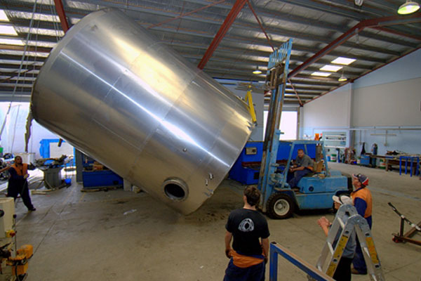 Stainless steel tank being manufactured